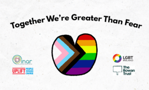 Title says, 'Greater than Fear', above a heart with the colours of the LGBTQ+ flag