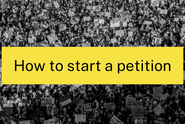 black and white image of people with text: How to start a petition